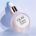 Olay Super Serum bottle with dropper on a light blue background