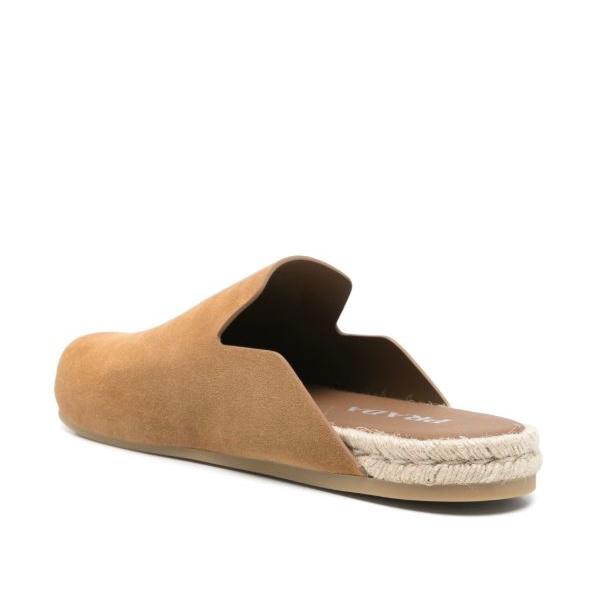 Brown slip-on sandal with espadrille sole on a white background