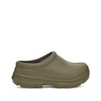 Green UGG Women's Tasman Clogs in Chestnut suede with embroidered braid detail shoe on a white background